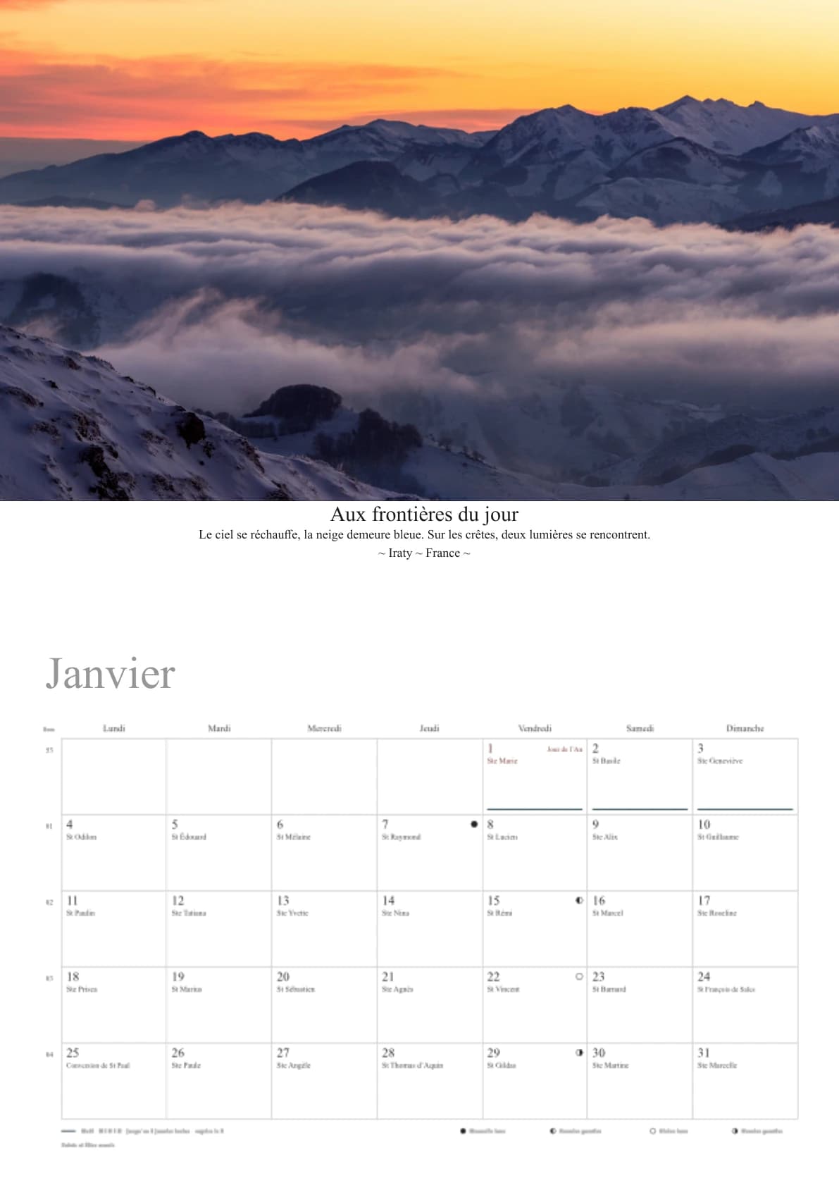 Page de janvier : paysage enneigé au-dessus d’une mer de nuages, légende et grille mensuelle avec espaces d’écriture.